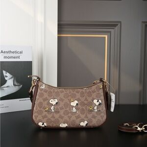 Coach X Peanuts Teri Shoulder Bag In Signature Canvas With Snoopy Print